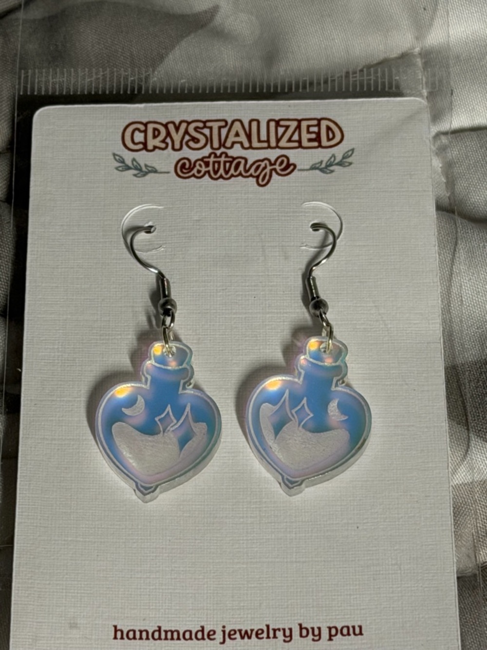 Iridescent Blue Heart Potion Earrings